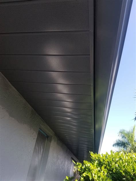 painting metal eaves of a house|painting aluminum fascia on house.